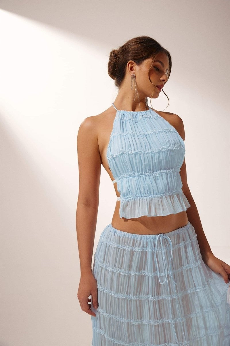 Miraee Paris light blue pleated chiffon two-piece set with a halter neck top and maxi skirt for summer boho style.